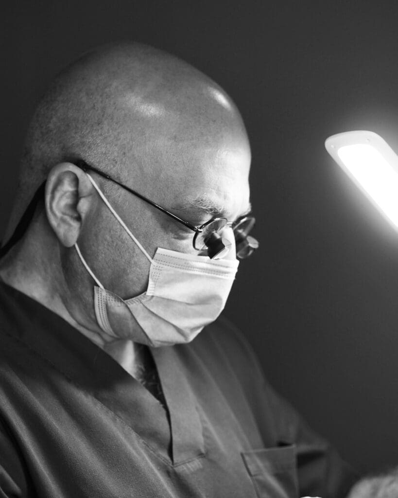 Mr Juma performing eyelid surgery